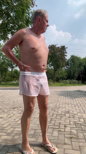 Jumping jack naked in public park