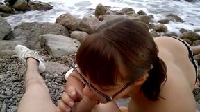 Public Beach Blowjob: Nerd sunbathing and wanted a Dick