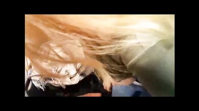 Public blowjob in changing room while saleswoman is sorting clothes outside..