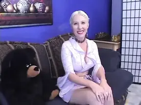 Hot blonde MILF gets off with a toy before two studs pound her