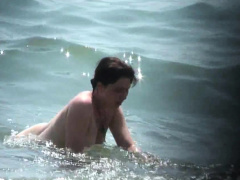 Public voyeur enjoys nude beach sex