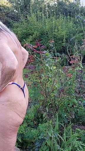 Watch 77 Years Old Martina Alsmost Naked in Her Garden