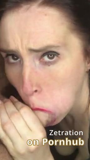 Beautiful brunette with red lipstick playfully plays with her tongue on my and says vulgar things