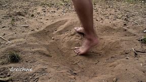 feet in the hot sand
