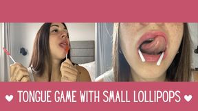 Tongue game with small lollipops. Watch me taste them!