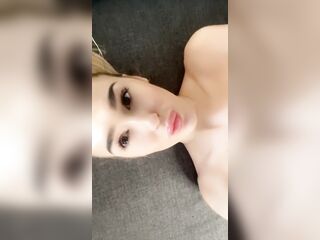 On my back showing melons