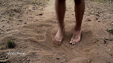 Feet in the hot sand