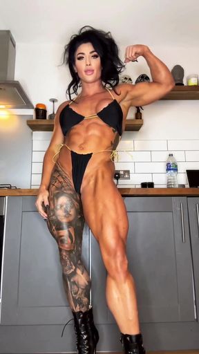 Female bodybuilder in kitchen