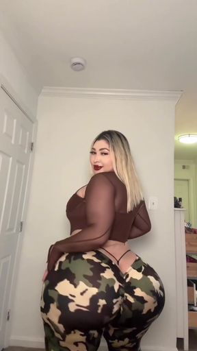 Big-boned Latina bimbo shakes her fake ass while twerking