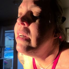 Struggling to pull out the dildo