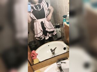 maid on front of mirror washing teets and pissing