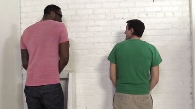 White guy sucks black stud off in a public bathroom before being railed