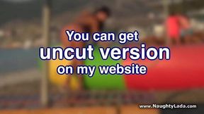Milf strips in public on beach
