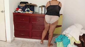 Chubby Mom Tidying Up Room And Folding Laundry 2