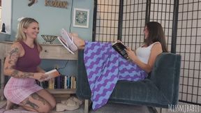 MJ and Astrid in a library nook foot worship