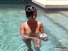 Babe on lilo naked in the sun