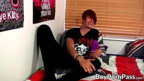 Skinny redhead Rhys Casey rubs his big cock before jizzing