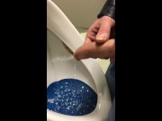 dirty boy pissing in dirty urinal