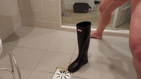 Pissing in her Hunter boots