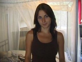 Sexy brunette gets her big boos sprayed with load