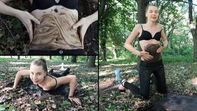 Nastya is having fun and covers her tummy with mud