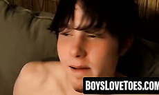 Inked studs Axel and Billy play with feet and hard dicks