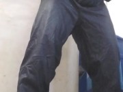 Hunk spews out huge load on the floor, in pvc boilersuit and rubber gloves