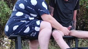 Stepmom in a public park fingering my dick on a bench