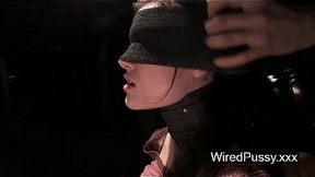 Wax-covered brunette babe dominated in BDSM electro scene