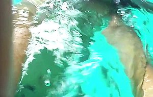 Holly gets nude in the pool