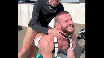 Hot muscle jock being fucked by hot daddy in rooftop