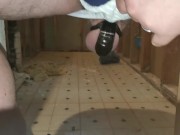 Frustrated slave rattles cage and shows off his hole