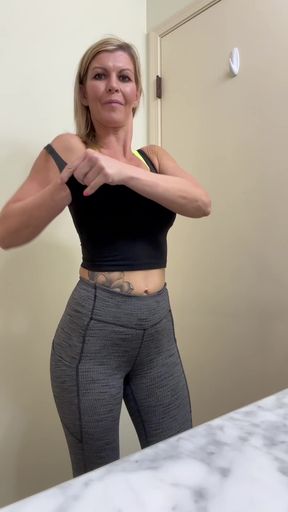 Female fitness model in gym