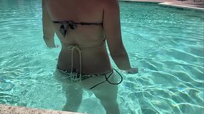 Hanging out in the pool wearing a bikini hot milf outdoor