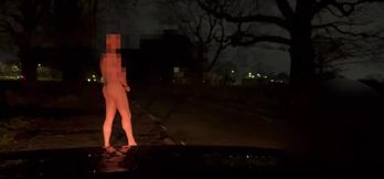 Patiently waiting naked outside for cars to hide from