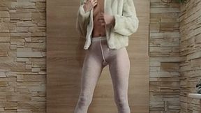 ANIA - A white outfit with high heels.