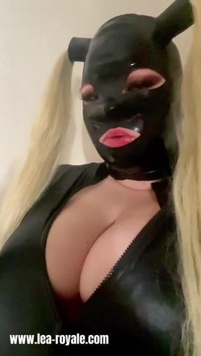 Vaping in latex mask wearing catsuit