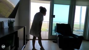 Sunning on the balcony in plain view of everyone walking by