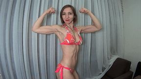 Muscles posing in bright bikini