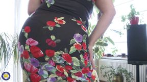 Hairy mature with huge tits is masturbating