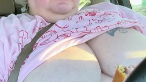 SSBBW Eats Corndog in Car While Driving With Her Tits Out