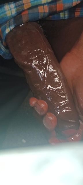 ChocolateMeatStick Putting On A Cock Ring Around His BBC With Oil