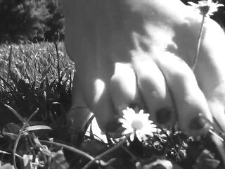 Nyllady Walking Barefoot on Th Grass in a Park