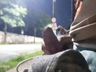 Risky masturbation with a glamorous redhead at the bus stop!