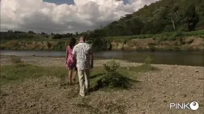 Two hot guys pleasure a slutty girl by the river