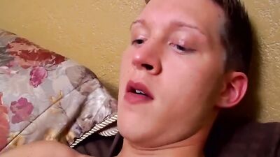 Slim young bottom spreads his legs up wide for big cock