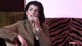 An elegant brunette MILF uses her holes to satisfy two very horny gentlemen