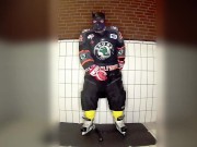 Rubber hockey pup pawing off