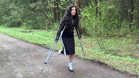 Lia walking on crutches, metal crutches walking, leg cast, broken ankle, one shoe walk