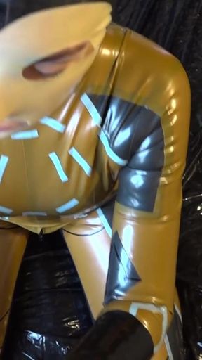 Latex Danielle try make cum to latex mask face